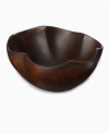 With a gently scalloped shape handcrafted in sustainable, farm-raised obeche wood, the Selena scalloped bowl made by Einstein Albert for Heart of Haiti's collection of serveware and serving dishes is truly one of a kind. A rich stained finish highlights the organic beauty of a serving piece that's inspired by the moon goddess but entirely down to earth.