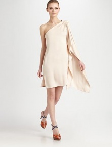 A dramatic, flowing drape lends beautiful movement to this asymmetrical silk design.Asymmetrical silk necklineShoulder drapeSingle long sleeveVented hemlineConcealed side zipAbout 21¾ from natural waistSilkDry cleanMade in ItalyModel shown is 5'10½(179cm)wearing US size 4. A dramatic, flowing drape lends beautiful movement to this asymmetrical silk design.Asymmetrical silk necklineShoulder drapeSingle long sleeveVented hemlineConcealed side zipAbout 21¾ from natural waistSilkDry cleanMade in ItalyModel shown is 5'10½(179cm)wearing US size 4.