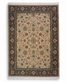 Inspired by the easily recognizable and intricately beautiful textiles of the Kirman region of ancient Persia, this Indo-Kirman rug features graceful floral designs in a rich palette of individually-dyed colors including indigo, soft blues, peach-corals, golds, lavender, and a multitude of soft greens. Patterned on an antique carpet woven circa 1910, it has a soft luster-wash that imparts a soft vintage finish. Inspired by the easily recognizable and intricately beautiful textiles of the Kirman region of ancient Persia, this Indo-Kirman rug features graceful floral designs in a rich palette of individually-dyed colors including indigo, soft blues, peach-corals, golds, lavender, and a multitude of soft greens. Patterned on an antique carpet woven circa 1910, it has a soft luster-wash that imparts a soft vintage finish.