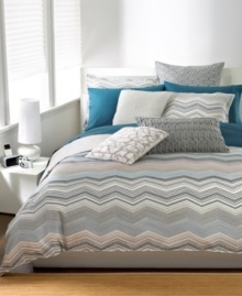 Design in motion! Multicolor zigzag patterns take center stage on this Bar III Bedding Moto comforter, giving your bed a modern update. The reverse features a muted pinstripe landscape for a contrasting effect. Design in motion! Multicolor zigzag patterns take center stage on this Bar III Bedding Moto comforter, giving your bed a modern update. The reverse features a muted pinstripe landscape for a contrasting effect.