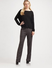 Tailored pants are buttoned at the waist to a flattering finish.Hook-and-bar and front zip closure On seam side pockets Back slash pockets Inseam, about 34 70% viscose/30% wool Dry clean Made in USA of Italian fabricModel shown is 5'10 (177cm)wearing US size 4. 