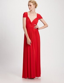 Simply divine-- floor-grazing jersey with a ruched empire waist and an enticing low-cut back. Deep sweetheart necklineCap sleevesRuched empire waistOpen backAbout 42 from natural waist92% modal/8% spandexDry cleanMade in USA Simply divine-- floor-grazing jersey with a ruched empire waist and an enticing low-cut back. Deep sweetheart necklineCap sleevesRuched empire waistOpen backAbout 42 from natural waist92% modal/8% spandexDry cleanMade in USA