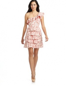 THE LOOKOne shoulder with ruffle trimAllover print in contrasting tonesHorizontal ruffles from waist to hemBand at waist with pipingSide zip closureTHE FITAbout 20 from natural waistFully linedTHE MATERIAL58% cotton/42% acetateLining: 65% polyester/35% cottonCARE & ORIGINDry cleanMade in USA THE LOOKOne shoulder with ruffle trimAllover print in contrasting tonesHorizontal ruffles from waist to hemBand at waist with pipingSide zip closureTHE FITAbout 20 from natural waistFully linedTHE MATERIAL58% cotton/42% acetateLining: 65% polyester/35% cottonCARE & ORIGINDry cleanMade in USA
