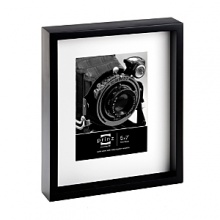 Display a treasured photograph in Prinz's black pine wood frame. White beveled matting highlights one 4 x 6 image while the shadow box design adds gallery-like impact. Display a treasured photograph in Prinz's black pine wood frame. White beveled matting highlights one 4 x 6 image while the shadow box design adds gallery-like impact.