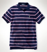 Rendered in ultra-breathable cotton mesh, a classic-fitting polo channels preppy style with a sleek striped pattern.