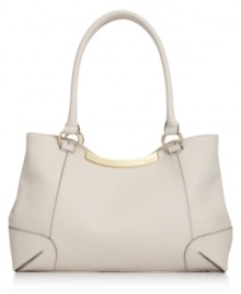 Completely covet-worthy, this sleek satchel from Calvin Klein is a contemporary classic. Clean lines, soft Saffiano leather and signature detailing lend an understated, elegant attitude that works from desk-to-dinner. Completely covet-worthy, this sleek satchel from Calvin Klein is a contemporary classic. Clean lines, soft Saffiano leather and signature detailing lend an understated, elegant attitude that works from desk-to-dinner.