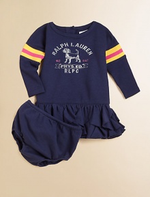 This playful ruffled dress combines a classic waffle-knit design and plush cotton for an athletic-inspired style.CrewneckLong dolman sleevesBack buttonsDrop-waistRuffled hemCottonMachine washImported Please note: Number of buttons may vary depending on size ordered. 