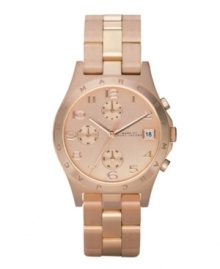 Light up the room with this impossibly rosy Henry watch by Marc by Marc Jacobs. Rose-gold ion-plated stainless steel bracelet and round case. Bezel etched with logo. Rose-goldtone chronograph dial features applied numerals at markers, date window at three o'clock, three subdials, three hands and subtle logo. Quartz movement. Water resistant to 30 meters. Two-year limited warranty. Light up the room with this impossibly rosy Henry watch by Marc by Marc Jacobs. Rose-gold ion-plated stainless steel bracelet and round case. Bezel etched with logo. Rose-goldtone chronograph dial features applied numerals at markers, date window at three o'clock, three subdials, three hands and subtle logo. Quartz movement. Water resistant to 30 meters. Two-year limited warranty.