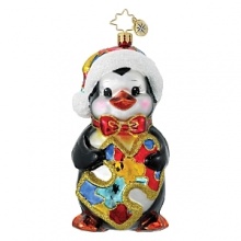 A cute penguin in a colorful santa hat and bow tie holds a multi-colored puzzle piece, the symbol for Autism Awareness. A cute penguin in a colorful santa hat and bow tie holds a multi-colored puzzle piece, the symbol for Autism Awareness.