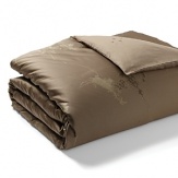 Delicate tree saplings in bronze, gold and umber tones are printed on a twill background on duvets, comforters, and shams in this organic, earthy bedding collection from Calvin Klein Home.