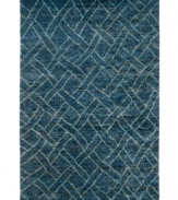 An enlarged, faded weave graphic creates a calming sense of symmetry in this Fairfield area rug from Lauren by Ralph Lauren. Its classic hues and soft composition of natural hemp and jute fibers present a welcoming, refreshing home accent in any room.