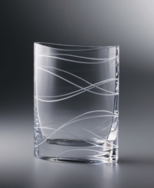 Inspired by the shape of a common shirt pocket, this stunning crystal vase bears an uncommon beauty. From acclaimed designer Karim Rashid, the rectangular vase stands 9-1/2 tall with curved sides and intertwining cut lines. Inspired by the shape of a common shirt pocket, this stunning crystal vase bears an uncommon beauty. From acclaimed designer Karim Rashid, the rectangular vase stands 9-1/2 tall with curved sides and intertwining cut lines.