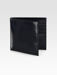 Streamlined design crafted in Italy from smooth saffiano leather.Two billfold compartmentsEight card slotsLeather4W x 4HMade in Italy Streamlined design crafted in Italy from smooth saffiano leather.Two billfold compartmentsEight card slotsLeather4W x 4HMade in Italy