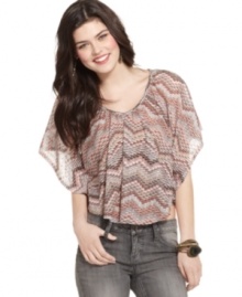 Score cool points from the fashion crowd with this printed poncho from Living Doll! Sports a chic crochet inset at the back! Score cool points from the fashion crowd with this printed poncho from Living Doll! Sports a chic crochet inset at the back!