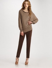 This body-skimming slim fit has a hint of stretch for the ultimate pair. Side hook and bar closure Side zipper Waist darts Inseam, about 29½ 97% polyester/3% spandex Dry clean Made in the USA 