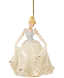 Fans of Disney will be enchanted by this beautiful Cinderella ornament from Lenox. The princess wears a traditional ballgown with sparkle accents. With gold hanging thread. Fans of Disney will be enchanted by this beautiful Cinderella ornament from Lenox. The princess wears a traditional ballgown with sparkle accents. With gold hanging thread.