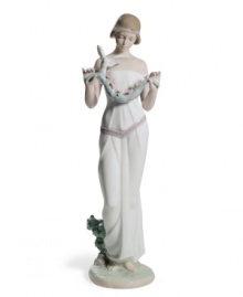 Holding a garland of pretty pink flowers, sweet Victoria brings natural beauty to any home in exquisitely handcrafted Lladro porcelain. Holding a garland of pretty pink flowers, sweet Victoria brings natural beauty to any home in exquisitely handcrafted Lladro porcelain.
