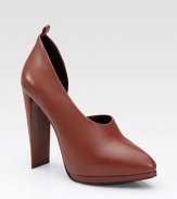 Luxe leather style in an elegant half- d'Orsay shape, finished with a chunky heel and slight platform. Self-covered heel, 5 (125mm) Platform, 1 (25mm) Compares to a 4 heel (100mm) Leather upper Leather lining and sole Padded insole Made in Italy