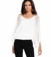 Dreamy chiffon creates a floaty outer layer on this top from Baby Phat, while beaded shoulder straps add a hint of glam!