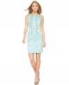 Put a little spring in your step. A woven jacquard ikat design is given a revamp for the season in this belted shift dress from Calvin Klein.