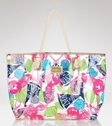 A colorful party of lobsters, seashells and sailboats mingles with anchors and citrus slices on this beach-ready Lilly Pulitzer tote.