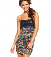 Get ready to party in this fun and colorful dress from Wishes Wishes Wishes! A solid-color sequin bust offsets the spunky print on this super-cute, strapless number!