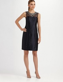 Timeless elegance, with a silk chiffon illusion yoke and a jewel-encrusted neckline.Sleeveless Jeweled neckline Sheer, silk chiffon front and back yoke Center back zip with button closures Back vent Fully lined About 22 from natural waist 51% wool/49% silk Dry clean Imported Timeless elegance, with a silk chiffon illusion yoke and a jewel-encrusted neckline.Sleeveless Jeweled neckline Sheer, silk chiffon front and back yoke Center back zip with button closures Back vent Fully lined About 22 from natural waist 51% wool/49% silk Dry clean Imported