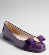 You don't have to be uncomfortable to look fashionable. Try these patent leather ballet flats with a classic Ferragamo bow and logo plate at toe.