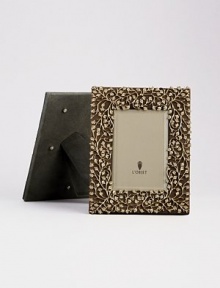 A charming 14k goldplate floral motif is laid over a suede background, creating an eye-catching, completely handmade frame fit for any treasured photograph. From the Lorel Collection Accommodates a 4 X 6 photograph Overall, 7¼ X 9 Imported A charming 14k goldplate floral motif is laid over a suede background, creating an eye-catching, completely handmade frame fit for any treasured photograph. From the Lorel Collection Accommodates a 4 X 6 photograph Overall, 7¼ X 9 Imported