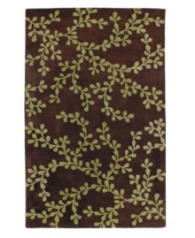 A lush pattern of lime-green leaves stretch across the rich brown background of this high-contrast area rug from Surya. Hand-tufted from poly-acrylic fibers that provide luxurious softness without shedding, this rug adds a striking, easy-maintenance accent to any living space. A lush pattern of lime-green leaves stretch across the rich brown background of this high-contrast area rug from Surya. Hand-tufted from poly-acrylic fibers that provide luxurious softness without shedding, this rug adds a striking, easy-maintenance accent to any living space.
