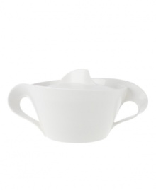 Servingware with an elegant and swirling silhouette. The New Wave covered vegetable bowl is crafted of fine china and makes a refined statement on any table. From Villeroy & Boch's dinnerware and dishes collection.