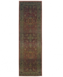 This long runner is ideal for hallways and entryways. A truly charming interpretation of a traditional carpet, this rug features a center medallion ringed by palmettes and floral details in sage green, topaz and slate blue against a rich burgundy ground. Striated effects create the weathered look of handmade rugs in a stain-resistant, no-shed manmade fiber. This long runner is ideal for hallways and entryways. A truly charming interpretation of a traditional carpet, this rug features a center medallion ringed by palmettes and floral details in sage green, topaz and slate blue against a rich burgundy ground. Striated effects create the weathered look of handmade rugs in a stain-resistant, no-shed manmade fiber.