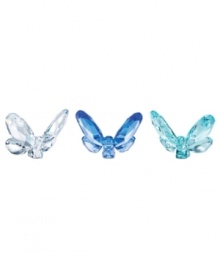 Faceted crystal butterflies in three shades of blue work as a trio or individually to freshen up a room. Perch on a potted plant, armoire or bookshelf. Faceted crystal butterflies in three shades of blue work as a trio or individually to freshen up a room. Perch on a potted plant, armoire or bookshelf.