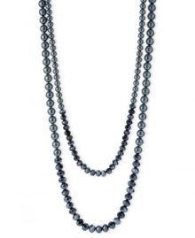 Classic elegance. This two-row necklace from Kenneth Cole New York is crafted from silver-tone mixed metal with navy glass pearls and beads combining for a stunning look. Approximate length: 31 inches + 3-inch extender. Item comes packaged in a signature Kenneth Cole New York Gift Box. Approximate drop: 2-1/2 inches. Classic elegance. This two-row necklace from Kenneth Cole New York is crafted from silver-tone mixed metal with navy glass pearls and beads combining for a stunning look. Approximate length: 31 inches + 3-inch extender. Item comes packaged in a signature Kenneth Cole New York Gift Box. Approximate drop: 2-1/2 inches.