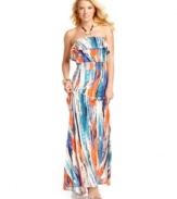 Adopt the season's bold fashion attitude with this maxi dress from GUESS? that marries a chic, ruffled neckline design with a powerful print!