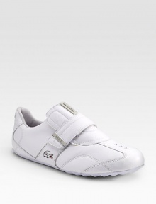 A chic spin on a sporty favorite in tumbled leather with a grip-tape strap closure and embroidered logo detail. Leather lining Padded insole Rubber sole Imported A chic spin on a sporty favorite in tumbled leather with a grip-tape strap closure and embroidered logo detail. Leather lining Padded insole Rubber sole Imported