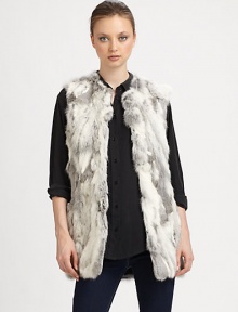 A textured natural or dyed rabbit style in an easy to layer vest design. Stand collarSleevelessOpen frontAbout 30 from shoulder to hemFully linedDyed or natural rabbitSpecialist dry cleanImported Fur origin: China