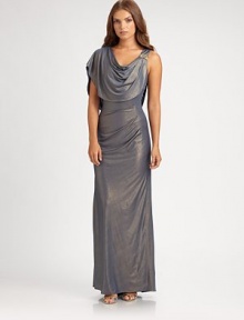 An elegant, dramatic asymmetrical drape defines this sparkling silhouette.Cowl necklineShoulder drapeBeaded detailSide tucksConcealed back zipFully linedAbout 48 from natural waistPolyester/spandexDry cleanImportedModel shown is 5'10 (177cm) wearing US size 4. 