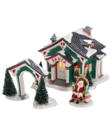 Check Santa's office hours before paying him a visit. A gate with a sign proves he's in, taking requests from the good boys and girls of Snow Village. Green siding with red trim and a fresh crop of snow add to the festive atmosphere. Check Santa's office hours before paying him a visit. A gate with a sign proves he's in, taking requests from the good boys and girls of Snow Village. Green siding with red trim and a fresh crop of snow add to the festive atmosphere.