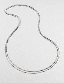 From the Chain collection. Elegant yet sturdy, this double strand of sterling silver features a 14k yellow gold logo at the clasp.Sterling silver 14k yellow gold Length, about 18 when doubled Lobster clasp Imported
