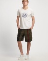 Be effortlessly cool with this logo graphic tee shaped in smooth, cotton knit.Crewneck51% polyester/22% cotton/13% lyocellMachine washImported