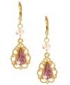 Decorated drops of pretty pink. Betsey Johnson's gold tone mixed metal earrings feature pink-colored crystal teardrops with gold-tone details and crystal accents. A small crystal accent decorates the post. Approximate drop: 2 inches.