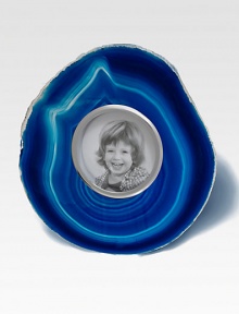 A charming way to showcase treasured photos, the Obra frame is crafted from semi-precious, hand-polished agate. Hand-polished aluminum, buffed to a mirror gleam, surrounds the photograph opening.4 diam.Accomodates a 2 round photoFabric easelAluminium hardwareAgateImportedPlease note that as this is a natural product, stones may vary. A charming way to showcase treasured photos, the Obra frame is crafted from semi-precious, hand-polished agate. Hand-polished aluminum, buffed to a mirror gleam, surrounds the photograph opening.4 diam.Accomodates a 2 round photoFabric easelAluminium hardwareAgateImportedPlease note that as this is a natural product, stones may vary.