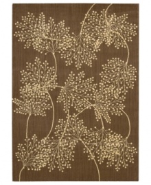 Enhance your living area with the beautiful look and sheen of Nourison's Capri rug. Woven of a blend of fine wool with Nourison's signature light-reflecting Luxcelle(tm) fibers, the luminous rug features a delicate leafy design across a rich chocolate background. Enhance your living area with the beautiful look and sheen of Nourison's Capri rug. Woven of a blend of fine wool with Nourison's signature light-reflecting Luxcelle(tm) fibers, the luminous rug features a delicate leafy design across a rich chocolate background.