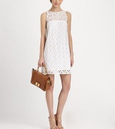 Airy cotton eyelet in an easy-fit shift styled with a sheer top yoke and open back keyhole.JewelneckSleevelessFlat frontButton back keyholeAbout 19 from natural waistCottonDry cleanMade in USA of imported fabricModel shown is 5'9½ (176cm) wearing US size 4.