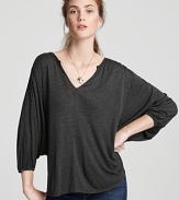 An ultra-billowy silhouette with dramatic dolman sleeves lends elegance to this Velvet by Graham & Spencer top, rendered in supple jersey.