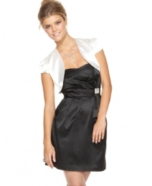 A perfect prom layering piece, this Roberta satin shrug adds a sophisticated flair to any dress! A perfect prom layering piece, this Roberta satin shrug adds a sophisticated flair to any dress!