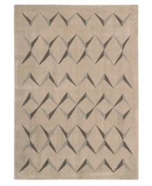 This visually arresting area rug has a simple design that casts striking shadows against a soft beige background. Hand tufted from 100% natural wool, this plush Calvin Klein rug is crafted using the cut-and-loop pile technique that creates a unique matte surface texture. This visually arresting area rug has a simple design that casts striking shadows against a soft beige background. Hand tufted from 100% natural wool, this plush Calvin Klein rug is crafted using the cut-and-loop pile technique that creates a unique matte surface texture.