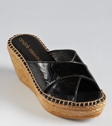 A silhouette that's easy to slip on and go, Andre Assous' Ashlee slides boast a carefree look in patent leather.