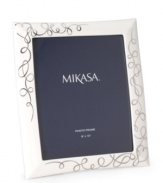 Show your romantic side. Loopy platinum hearts in white porcelain make the Love Story picture frame from Mikasa a beautiful way to display wedding or anniversary photos.